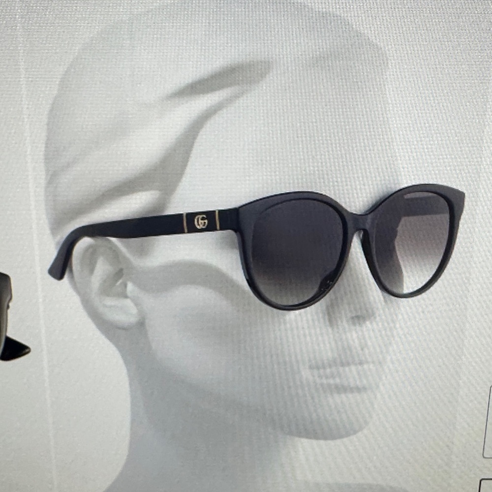 Gucci Black Sunglasses with Gold Accent. Case included.